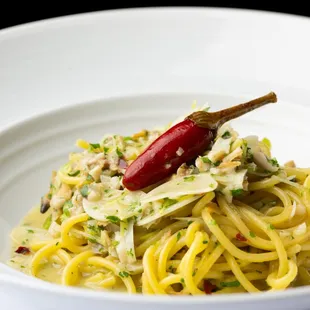 Spaghetti - manila clam, baby leek, lemon, parsley. Handmade pasta at Marea Beverly Hills.