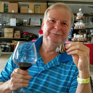 Enjoying wine and chocolate-covered strawberries at the Wine and Chocolate Lovers Weekend.  2/15/16.