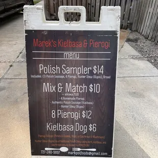 Menu in front of food truck.