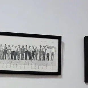 Apparently, one day the men in the pic on the right had nothing to wear so they wore tuxedos to work cattle.