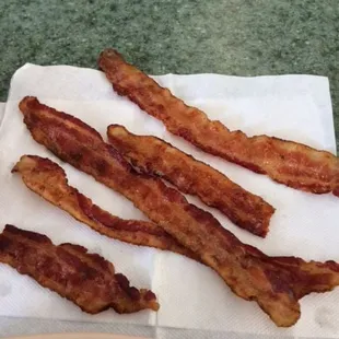 bacon strips on a napkin