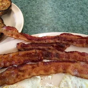 bacon and eggs on a plate