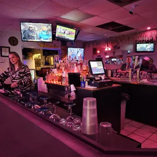 a woman sitting at the bar