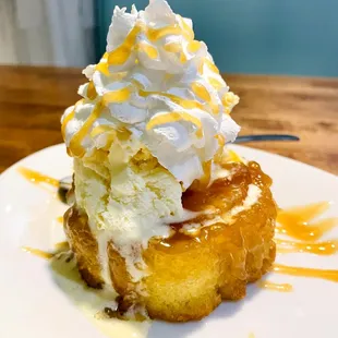 a desert with ice cream and caramel sauce