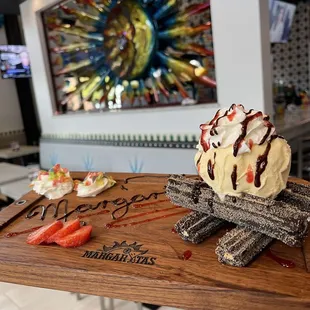 ice cream sundae and strawberries