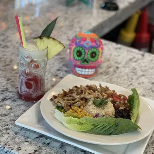 a plate of food and a drink