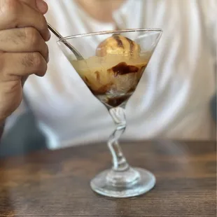 a man eating a dessert