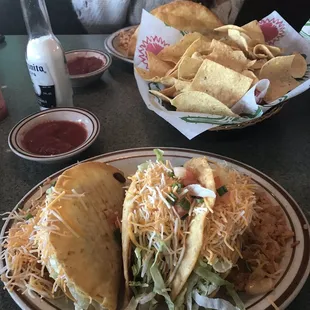 Tres Tacos, chicken, flour, fried. Double rice. 10$