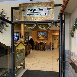 the entrance to a mexican restaurant