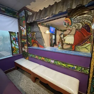 a view of a colorful restaurant