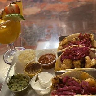 Mango margarita and shrimp tacos