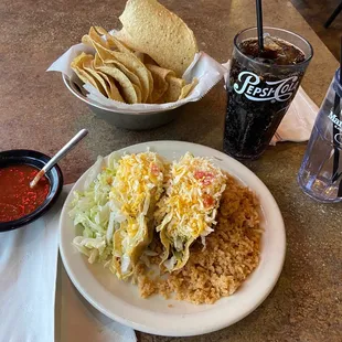 2 beef taco lunch special with rice, chips and salsa, and pepsi