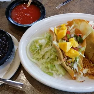 Tilapia and steak queso puffy taco dinner