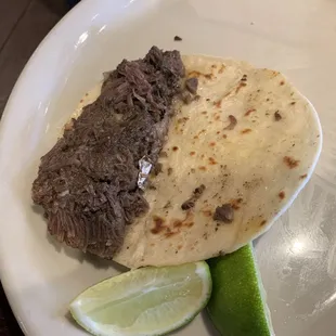 Barbacoda taco with aluminum foil.