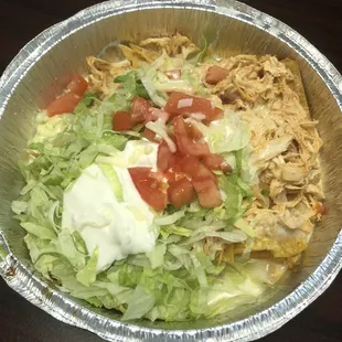 Margarita nachos. Lot of chicken, not many nachos, no beans