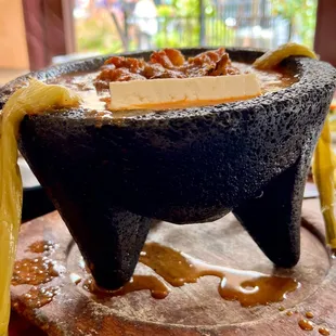 Authentic Molcajete served in a Volcanic Rock bowl.