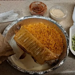 Chimichanga (fried) with rice.