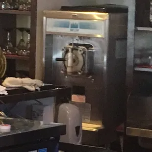 One of the two soft serve machines at the bar.