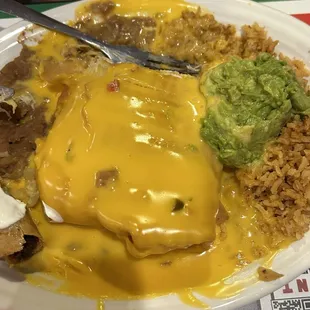 Fluorescent cheese... what the heck is this??? Didn't know they were serving velveeta cheese on chimichangas nowadays...