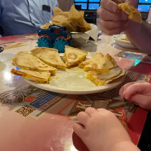 a child eating a sandwich