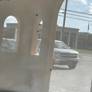 This are flies dead inside behind a sign and is great representation of the place as a whole.