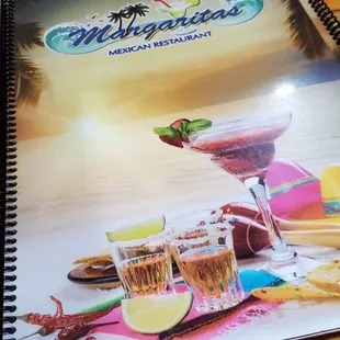 a book and a pen on a table