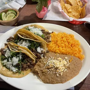 Steak tacos , rice &amp; beans , Tequila sunrise