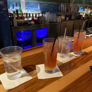 Our drinks (placed on napkins by the bartendress)