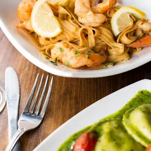 a plate of shrimp and pasta