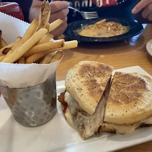Chicken parm on focaccia with fries.  Lunch special