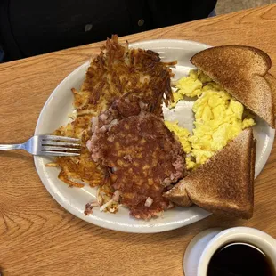 Corned beef eggs hash browns toast