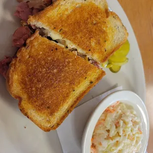 Reuben sandwich with side of coleslaw
