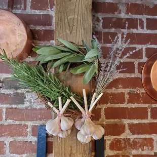 Beautiful and Perfect herb wreath brought by one of her Farmers