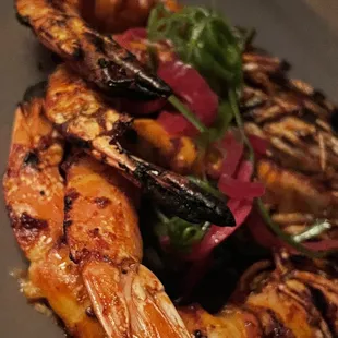Grilled prawns with calabrian chili butter &amp; scallion ash