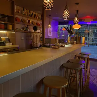 a bar with stools