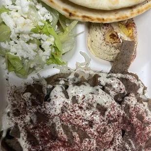 Lamb gyro plate comes with Tzatziki sauce and pita bread