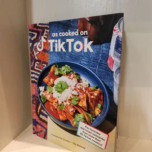 a cookbook on a shelf