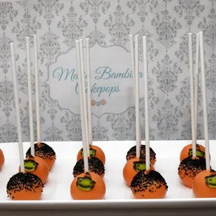 oranges with black sprinkles