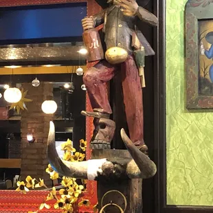 a statue of a mexican man