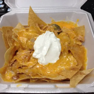 6/29/16 Maria Bonita Lunchwagon (hnl)-Nachos $9.  Chips, chix, refried beans, jalapeño, cheddar &amp; mozzarella cheese &amp; sour cream