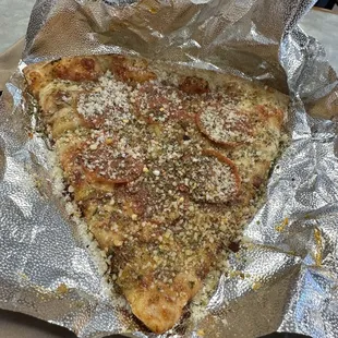 Infamous Pepperoni Pizza Slice
