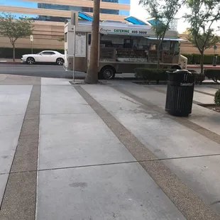 a food truck parked on the side of the road