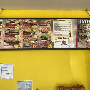 a menu on a yellow wall