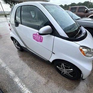 The cute delivery car.
