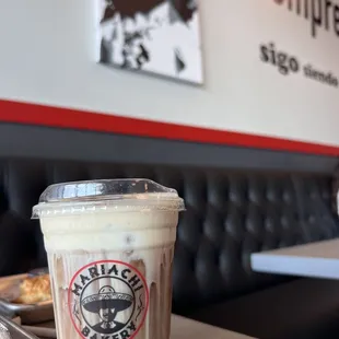 a cup of coffee on a table