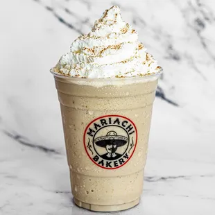 Horchata Frappe - Sweetened Horchata flavors, blended with our Espresso Roast, milk and ice, topped with whipped cream and sprinkled with ci
