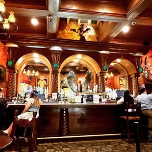 people sitting at the bar