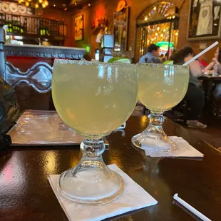 two margaritas on a table