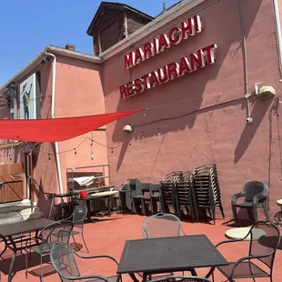 tables and chairs outside a restaurant