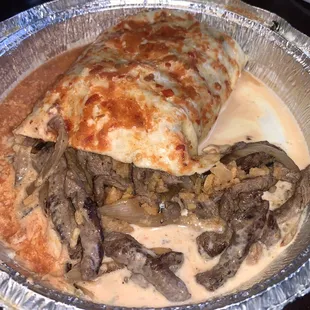 Wow! The steak and cheese burrito was packed full of steak, caramelized, onions, and rice! The cheese was phenomenal! Very filling!